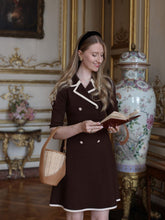 A girl wears a ruched dress
